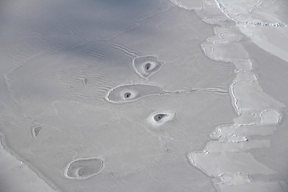 Operation IceBridge offers theories on mysterious holes in Arctic ice